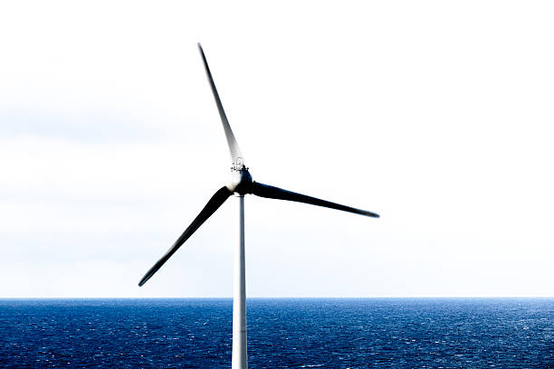 istock One offshore wind turbine in simple copy space design 623198720