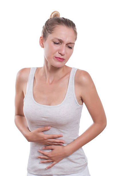 istock Young woman is having stomach ache 623200134