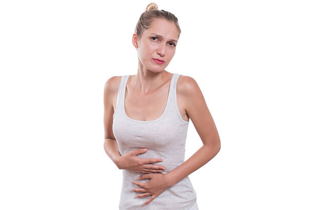 istock Young woman is having stomach ache 623200188