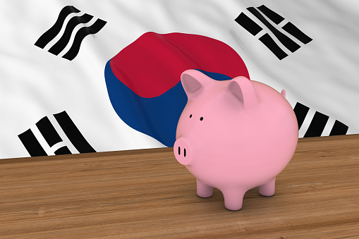 South Korea Finance Concept - Piggybank in front of South Korean Flag 3D Illustration
