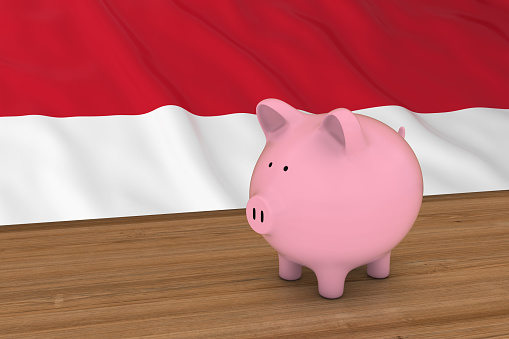 Monaco/Indonesia Finance Concept - Piggybank in front of Monegasque/Indonesian Flag 3D Illustration