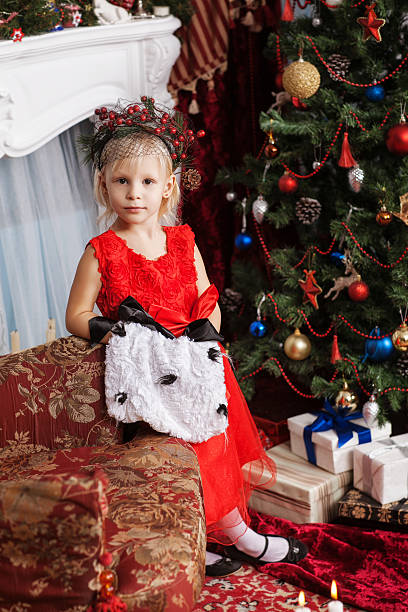 istock Girl in a red dress 623205246