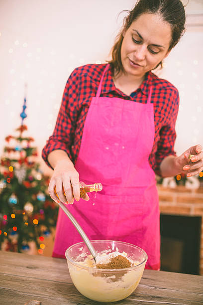 istock woman making gingerbread and cookies 623205772