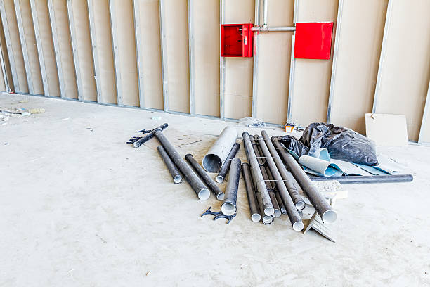 Front view of gypsum wall with galvanized steel joints View at unfinished thermal partition dry wall, plasterboard under construction. zinced steel stock pictures, royalty-free photos & images