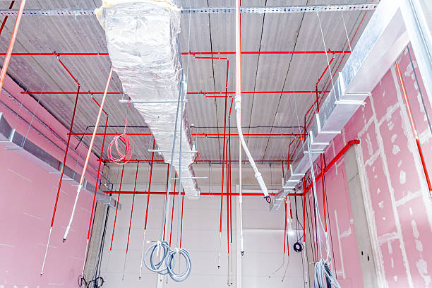 istock Fire sprinkler system with red pipes is placed to hanging. 623207848