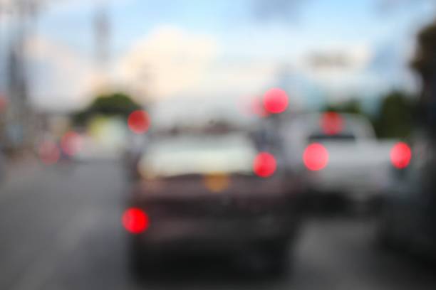 istock Car on road in city,  Blur bokeh light 623208224