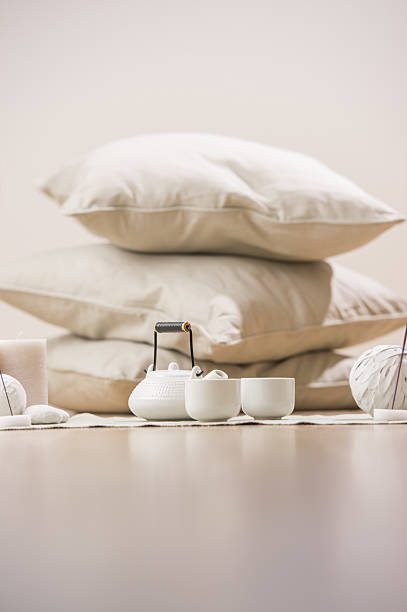 istock Tea set with incense sticks and candles with pillows 623208650