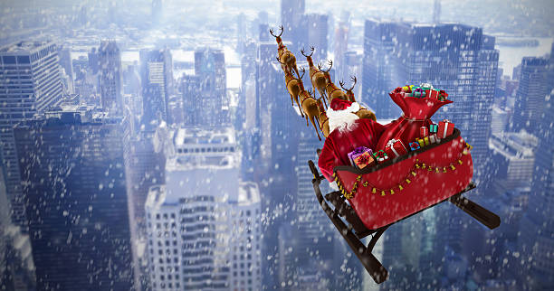 istock High angle view of Santa Claus riding on sled 623209104