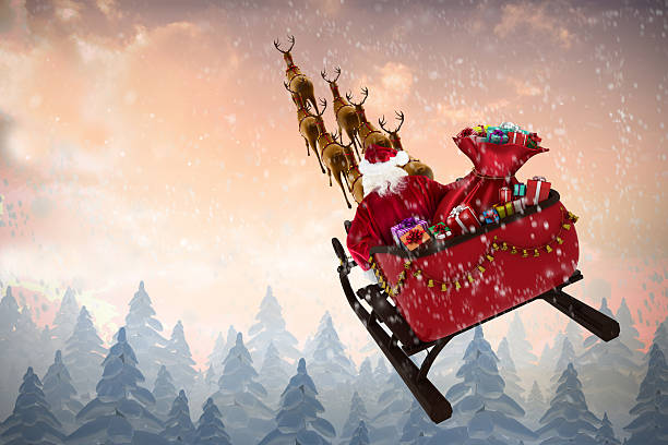 istock High angle view of Santa Claus riding on sled 623209254