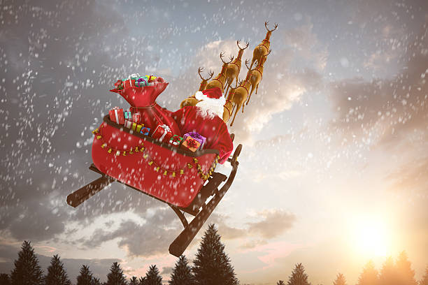 istock High angle view of Santa Claus riding on sled 623209320