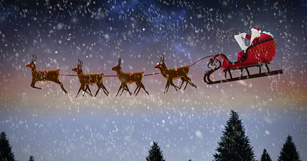 istock Santa Claus riding on sleigh during Christmas 623209370