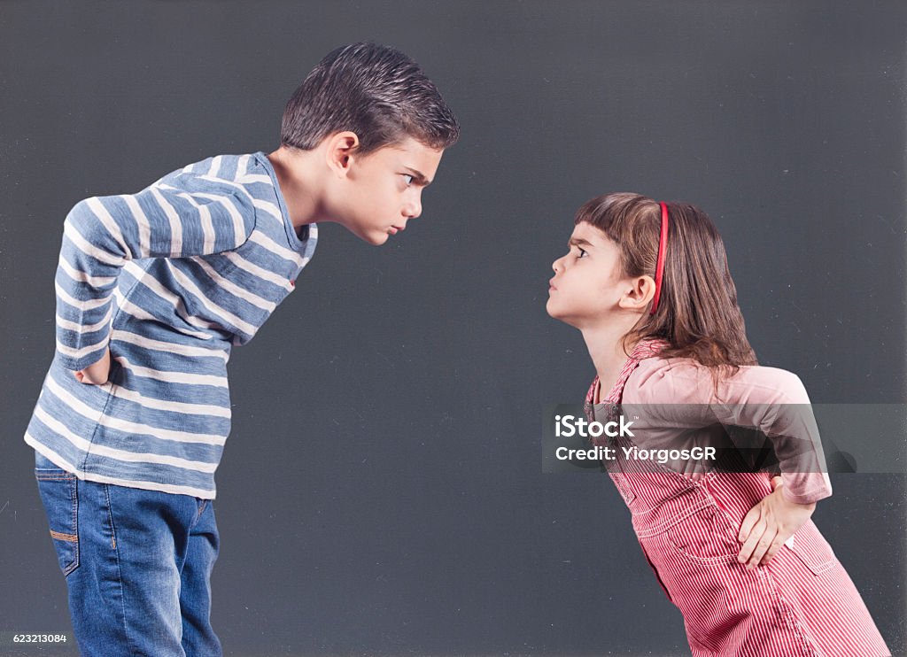 Kids having an argument Brother and sister having an argument. Family relationships concept Arguing Stock Photo