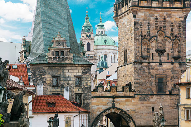 istock Old Prague architecture. City roofs on the blue sky background. 623213980