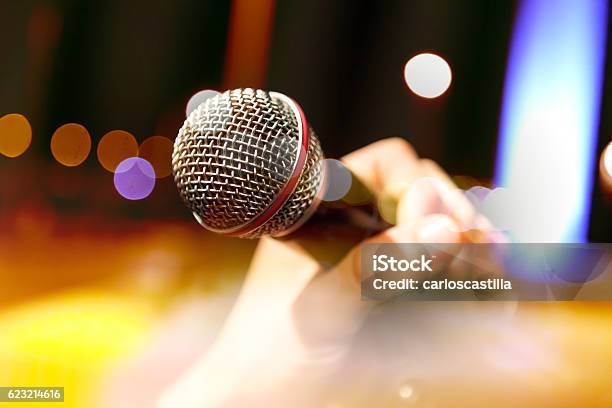 Musical Backgroundmic And Singer Stock Photo - Download Image Now - Microphone, Karaoke, Human Hand