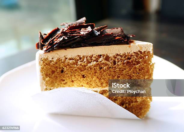 Piece Of Mocca Coffee Cake On White Plate Stock Photo - Download Image Now - Cake, Nut - Fastener, Almond