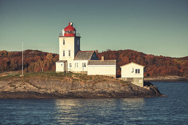istock Tyrhaug Lighthouse. Coastal tower, old style 623267862