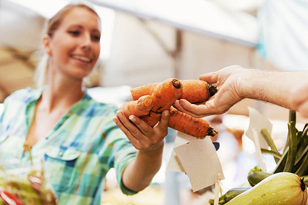 istock Close up Concept. Buying Carrots. 623273818