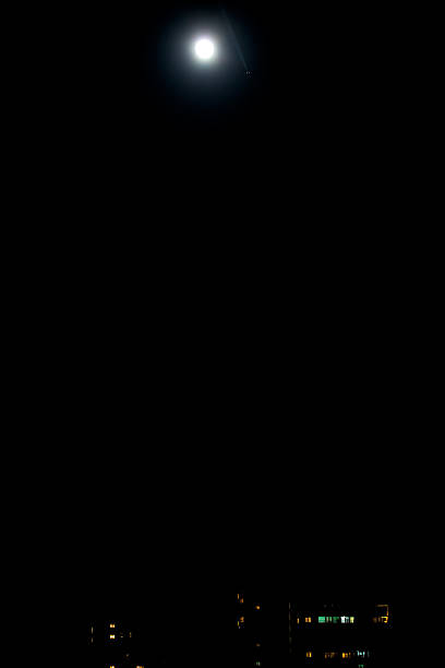 istock Photographing Big Moon with Military Airplane 623275138