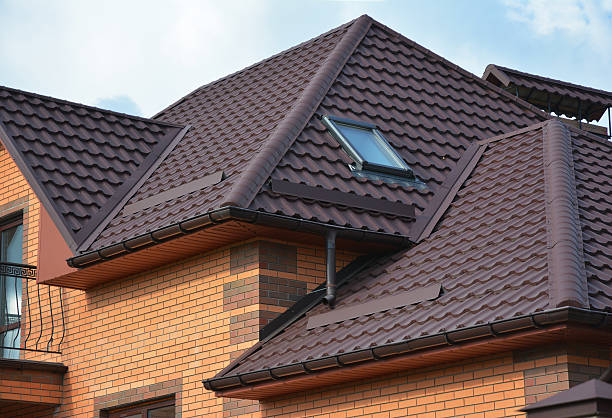 istock Attic skylights, rain gutter system, roof windows and roof protection 623277182