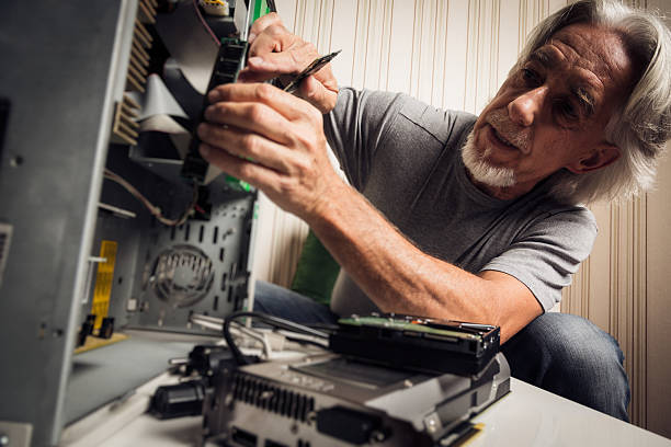 Man Installing Computer 140+ Old Computer Tower Stock Photos, Pictures & Royalty-Free Images ...