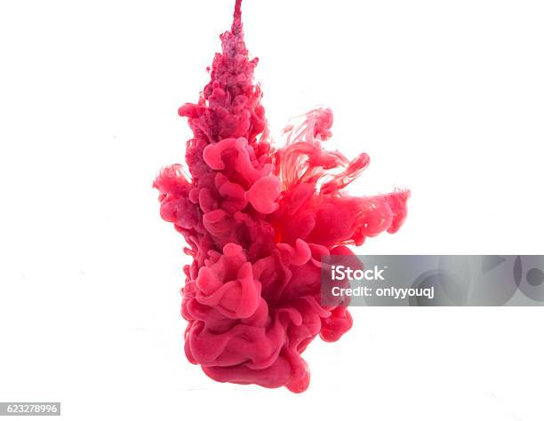 Abstract Formed By Color Dissolving In Water Stock Photo - Download Image Now - Water, Ink, Red