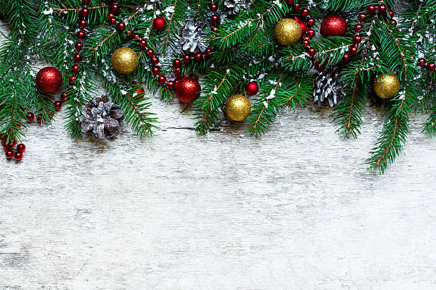 istock christmas background with fir branches and decorations covered with snow 623279864