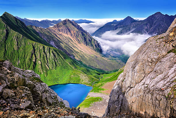 istock Low clouds in valley of lake 623280130