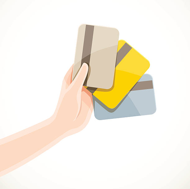 ilustraciones, imágenes clip art, dibujos animados e iconos de stock de mano femenina sosteniendo tres tarjetas de crédito de oro, platino y normal - credit cards