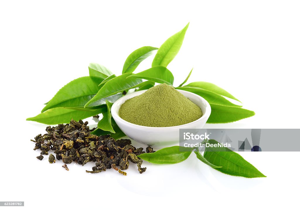 powder green tea and leaf  on white powder green tea and green tea leaf  on white background Green Tea Stock Photo