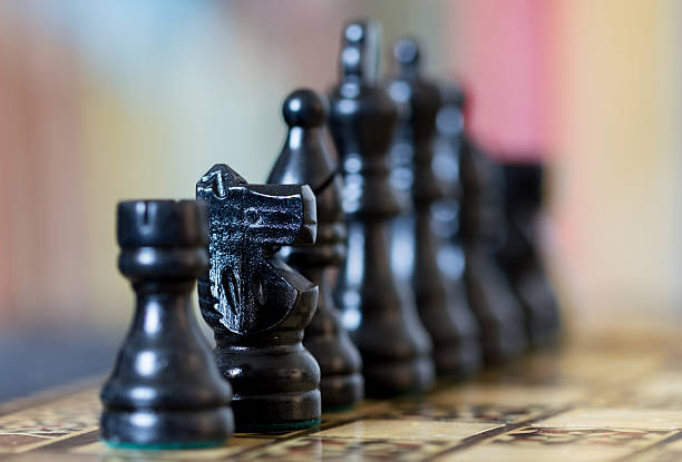 istock Close up of black chess pieces with blurred background. 623283624