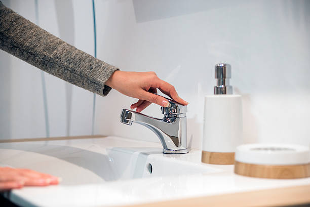 hygiene. cleaning hands. washing hands. woman wash their hands - close to moving up closed women imagens e fotografias de stock