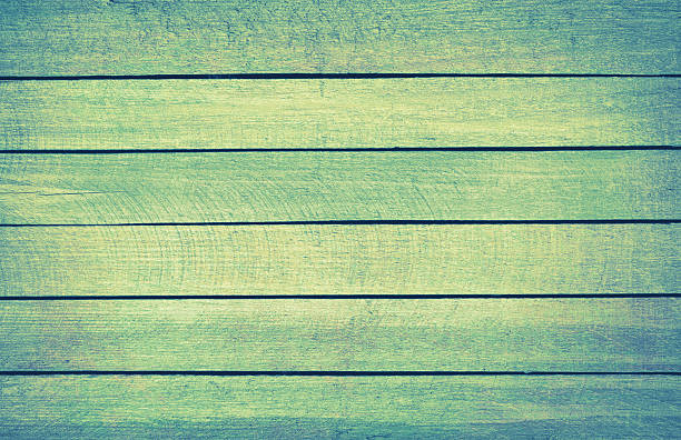 istock Light green wooden planks, tabletop, floor surface or wall. 623289496