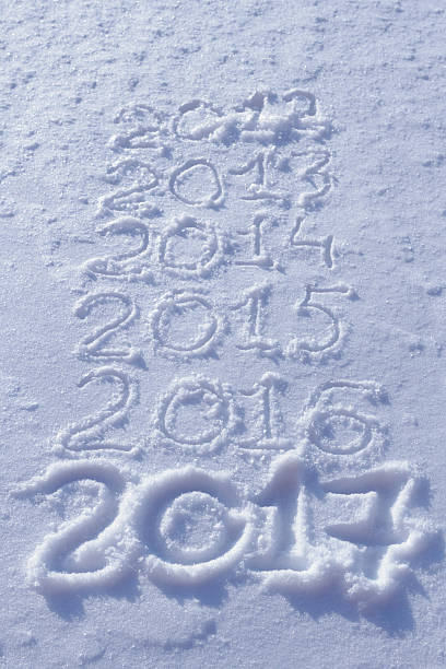 istock new years date 2017 written in fresh powder snow 623292728