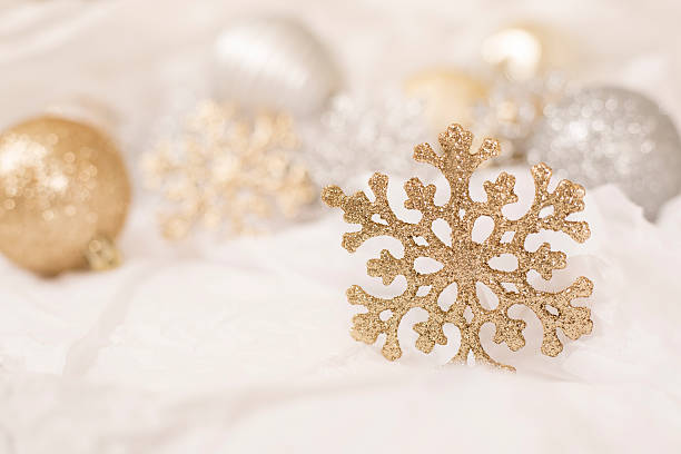 istock Gold Christmas snowflake ornament on white background. 623293072
