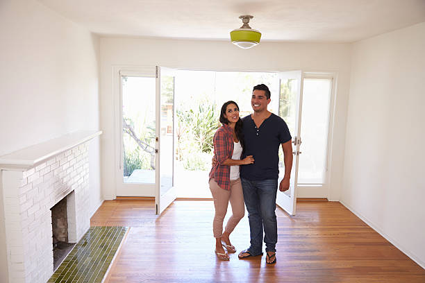istock Excited Couple Explore New Home On Moving Day 623294408