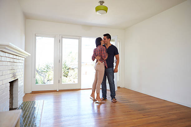 istock Romantic Couple In New Home On Moving Day 623294512