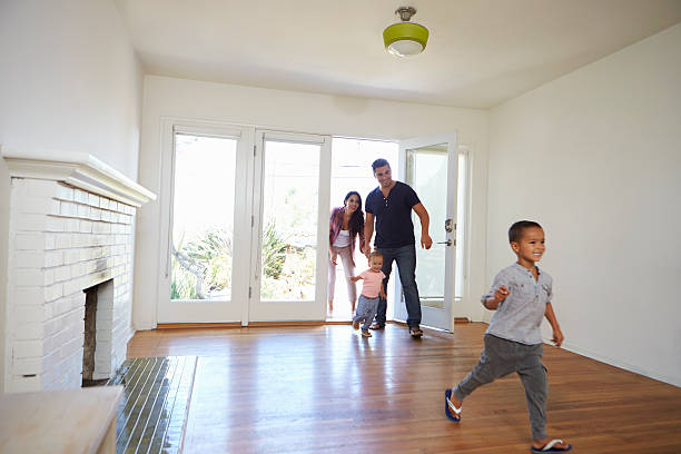 istock Excited Family Explore New Home On Moving Day 623294532