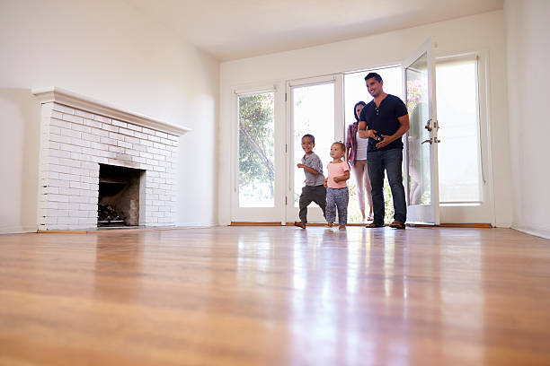 istock Excited Family Explore New Home On Moving Day 623294654