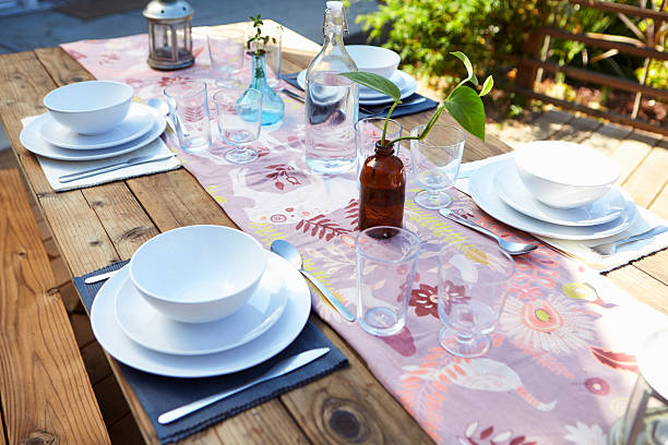istock Table Set For Outdoor Meal On Wooden Table In Garden 623295002