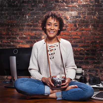 Young african American woman freelance photographer portrait.