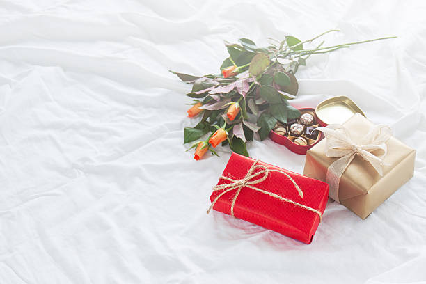 istock Beautiful colorful pretty gift or present in with coffee, chocolate 623295944