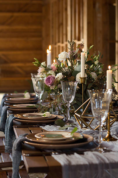 istock Laid Table By wedding banquet in a barn. Vertical. 623298872