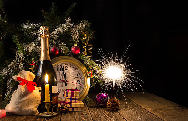 istock Sparks of Bengal fire and champagne bubbles 623299568