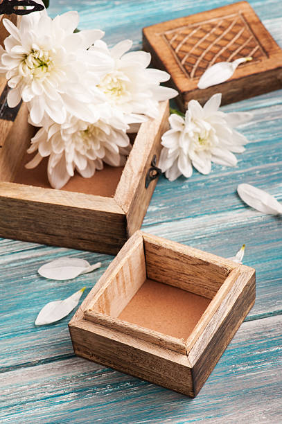 istock rustic wooden box and bouquet of flowers 623300802