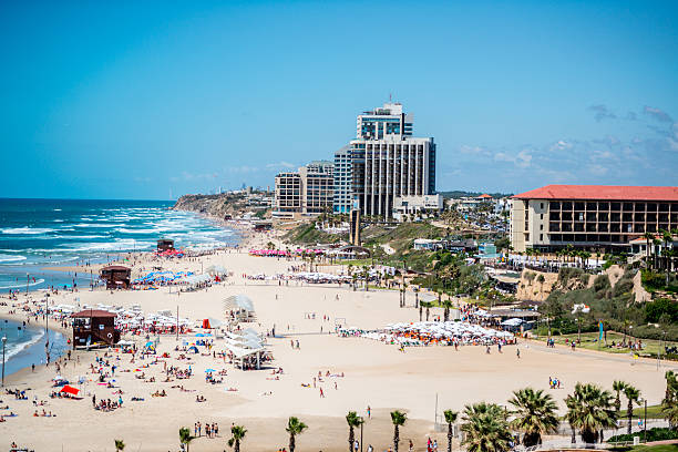 istock People relaxing on Herzliya Beach, Tel Aviv,Israel 623300888