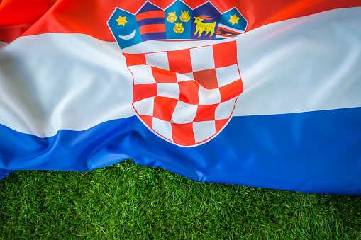 Croatian flag on green grass