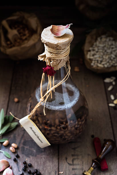 istock clove of garlic placed over a bottle containing cow pea 623305298