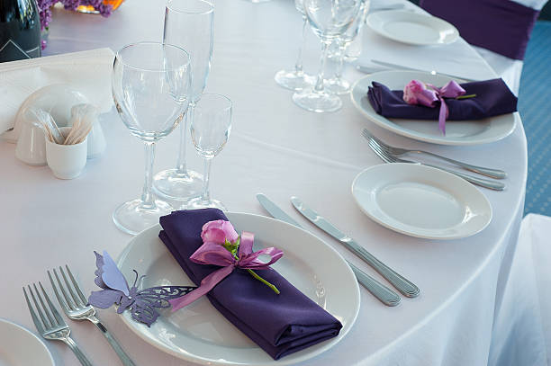 festive table setting in the restaurant with flowers. wedding decor. - table wedding flower bow imagens e fotografias de stock