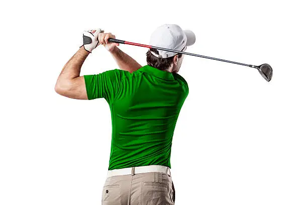 Golf Player in a green shirt taking a swing, on a white Background.