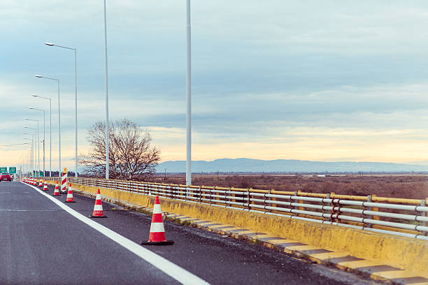 istock Traffic cones showing caution for maintenance of the road 623307980